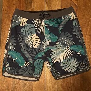 Rip Curl surf shorts. Size 32. Never worn. Smoke and pet free home.